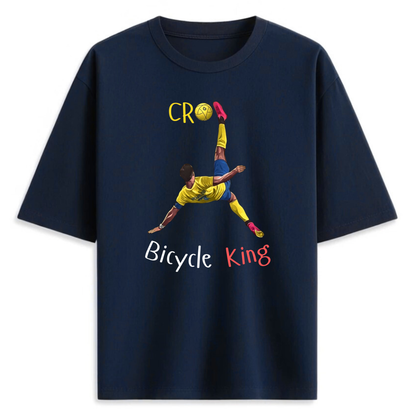 Navy Blue t-shirt with a graphic of Ronaldo doing a bicycle kick and text on a white background that says 'Bicycle King'