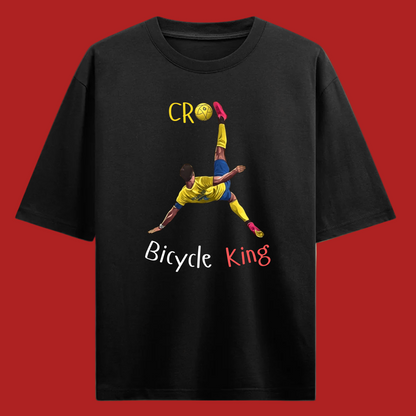 Black t-shirt with a graphic of Ronaldo doing a bicycle kick and text on a red background that says 'Bicycle King'