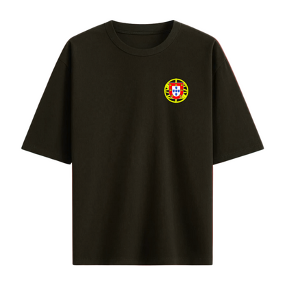 Black t-shirt with a small portugal emblem on the chest on a white background